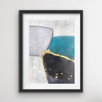 An abstract acrylic painting on paper, in a white mat, framed in a modern black frame. The painting is turquoise, grey, and white with accents of metallic gold. There are three freeform shapes , one is grey, one is turquoise and one is black. A gold line runs between the shapes and there are some splashes of gold and white atthe bottom.